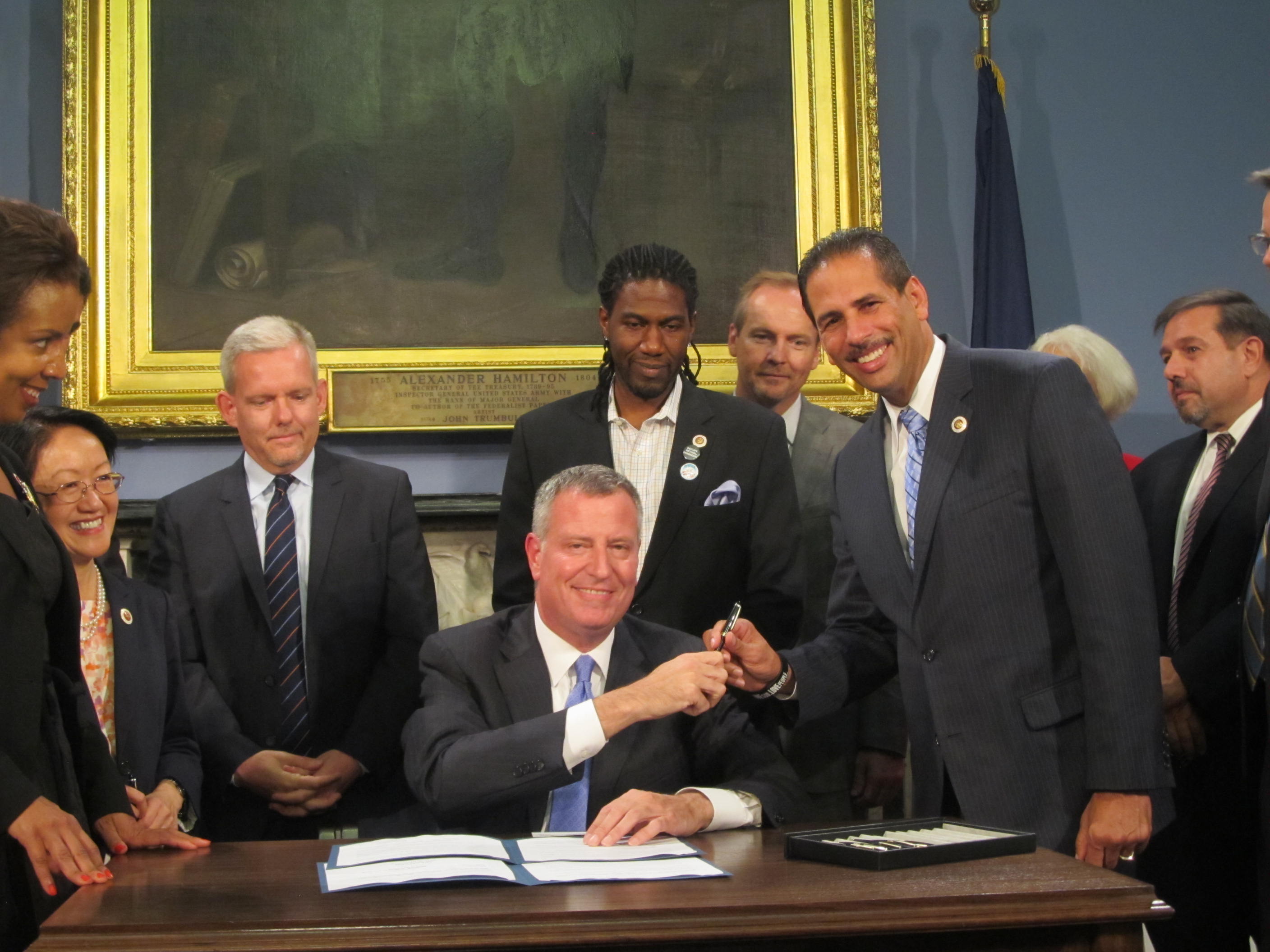 The Tenants Bill of Rights is signed into law.  (l to r) Council Member Margaret Chin, Council Member Jimmy Van Bramer, Mayor Bill de Blasio, Council Member Jumaane D. Williams, and Council Member Fernando Cabrera.  Image credit:  Office of Council Member Fernando Cabrera